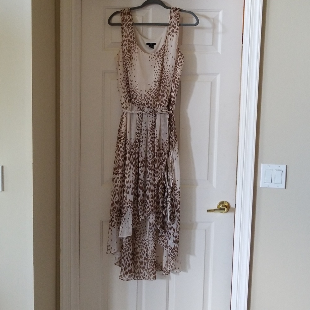 JBS sleeveless animal print dress with hi low hem.